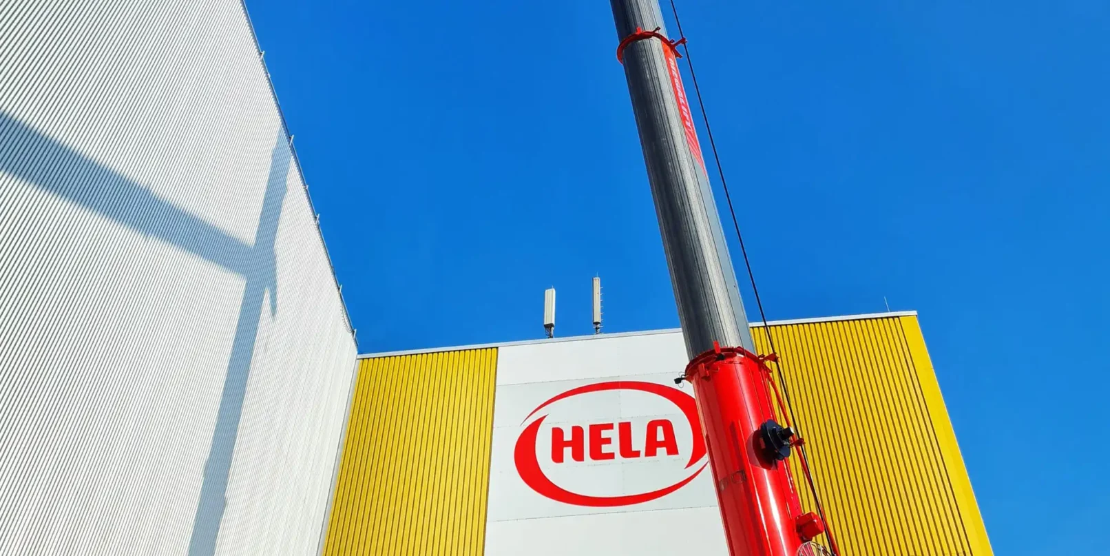 groepper architekten referenz industriebau 06 hela hochregallager logo