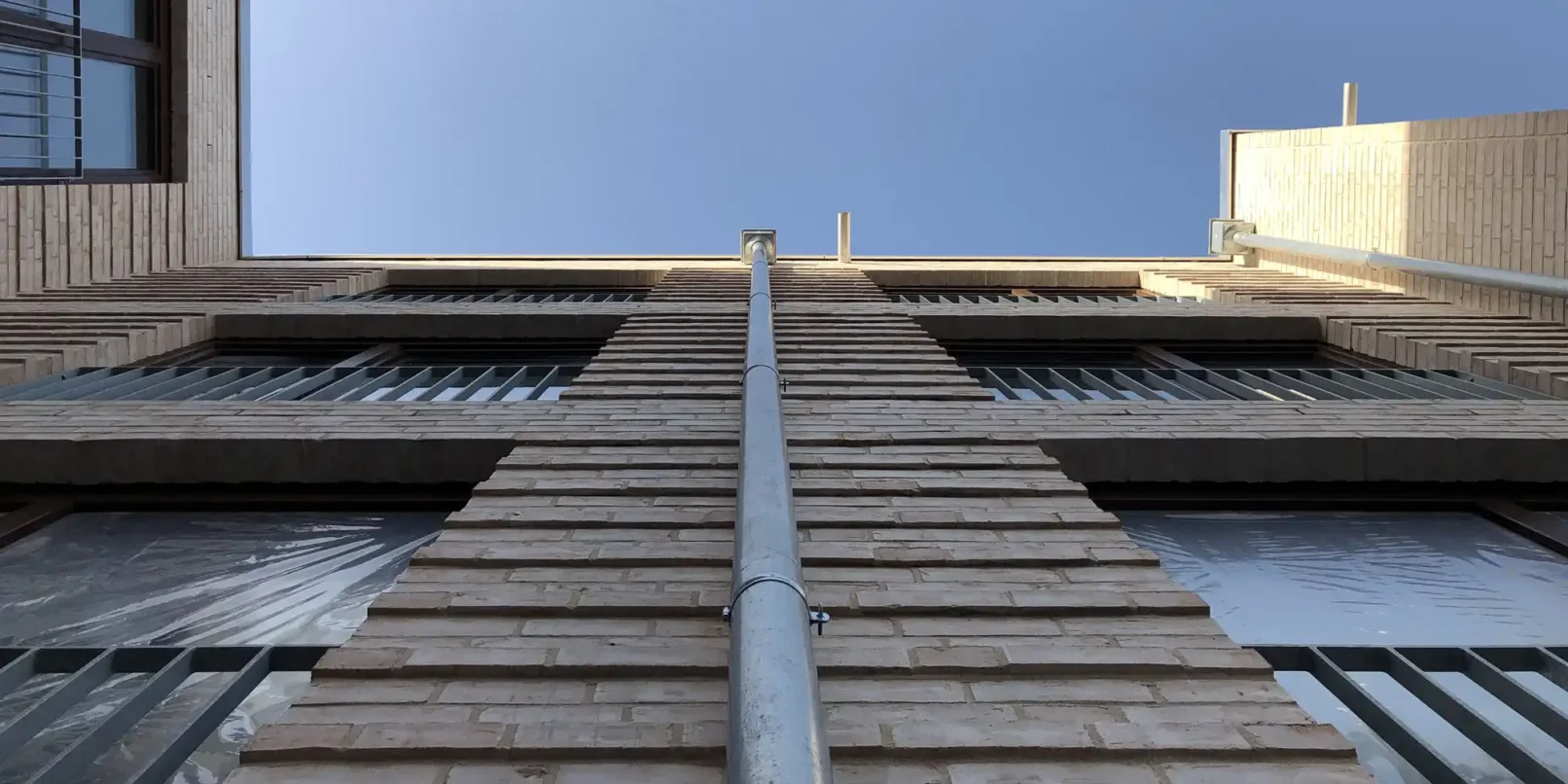 groepper architekten referenz wohnungsbau luebeck trave hertzweg verblendsteinfassade regenfallrohr