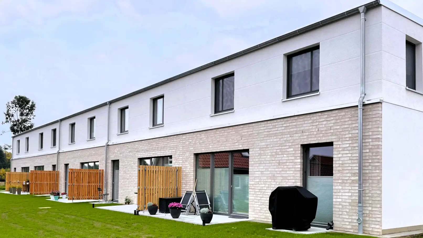 groepper architekten referenz wohnungsbau luebeck trave rothebek stadthäuser terrassen