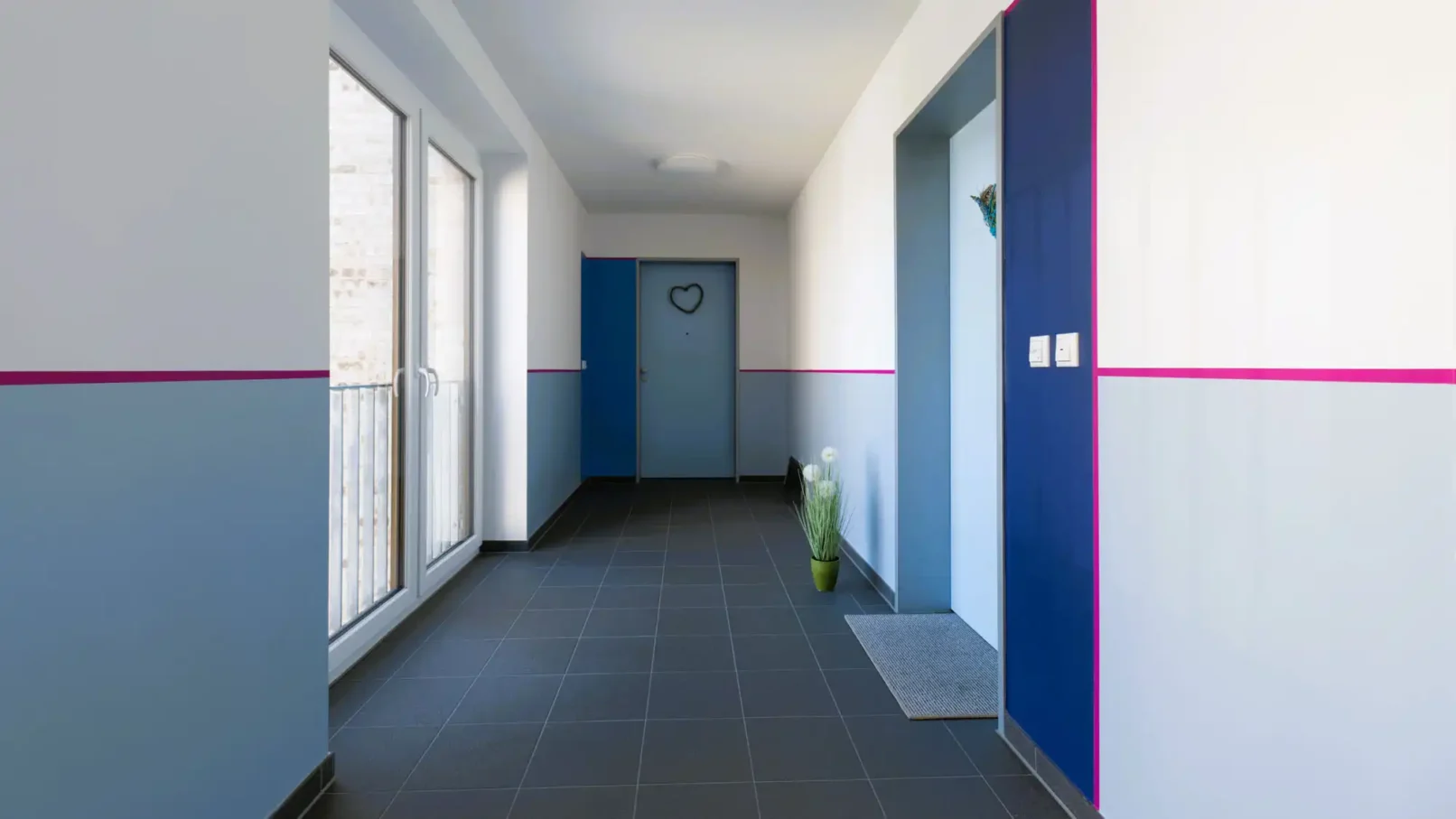 groepper architekten referenz wohnungsbau luebeck trave hertzweg begleitstreifen malerarbeiten farbkonzept